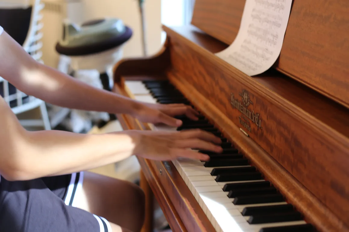Michael Wang playing piano